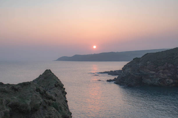 istock Rugged cliffs and sunset  off the Clonakilty, West Cork coastline. 1219348961