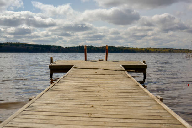 istock Wooden dock near the waterside, Lake Saimaa. 1219349193