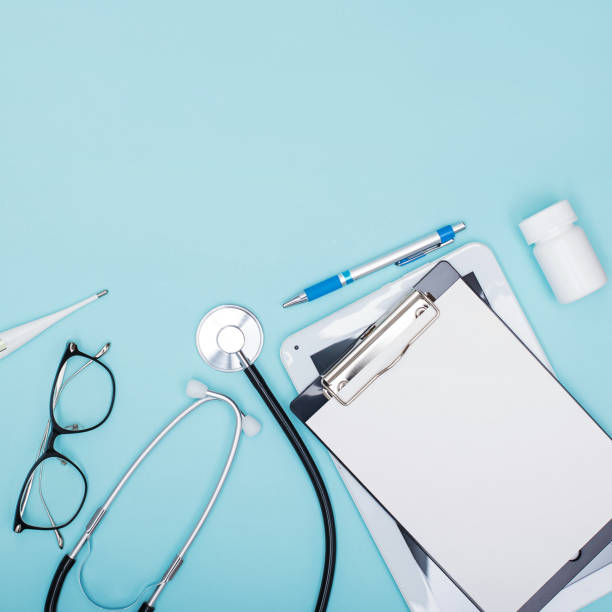 istock Medical devices and accessories on blue bacground. 1219352290