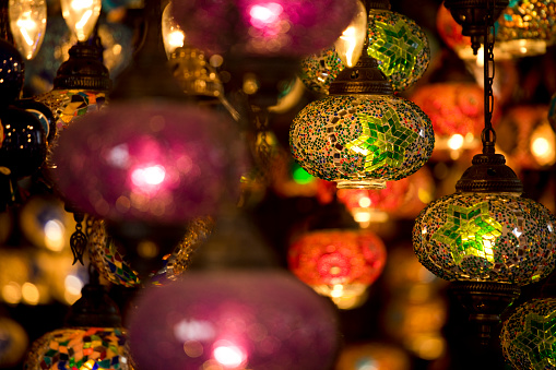 Decorated chandeliers and lamps on display at Surajkund Mela