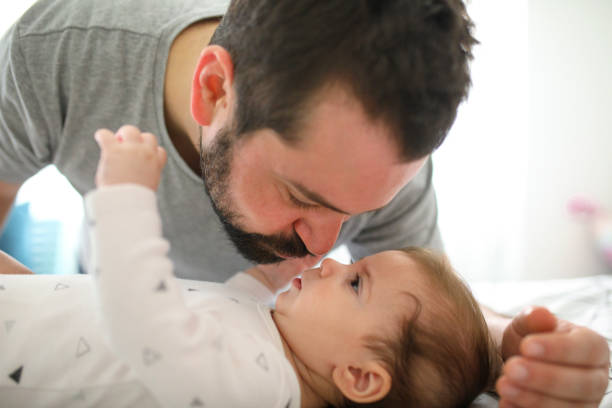 istock Happy father playing with his baby daughter 1219355479
