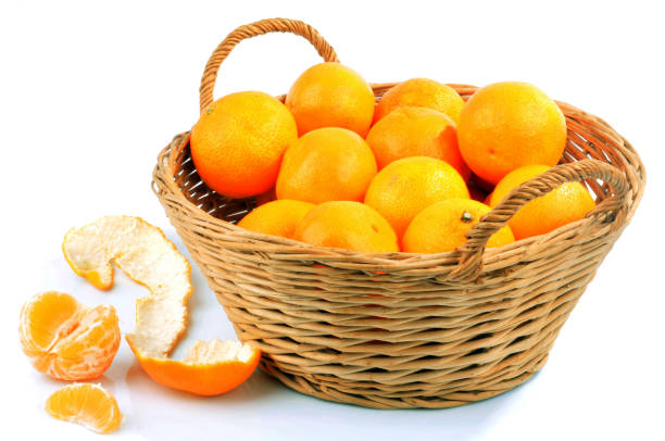 istock Tangerine basket on white background 1219358439