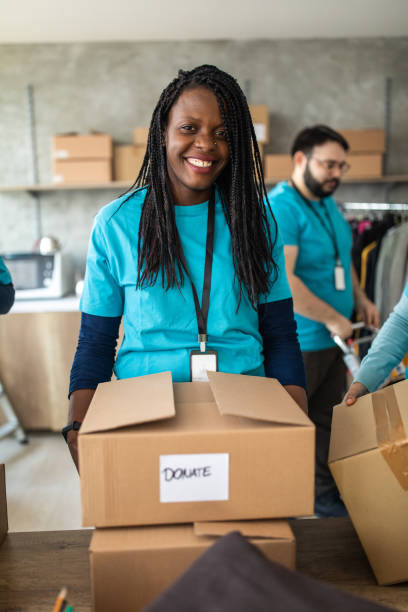 istock African woman working at charitable foundation 1219364705