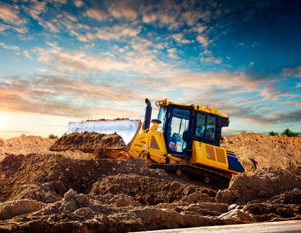 istock Yellow bulldozer at a construction site 1219365623