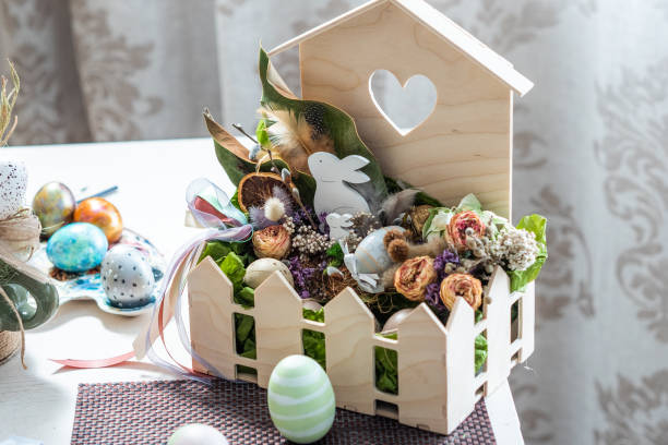 istock Easter tradition. Close-up shot of basket with colored eggs 1219370363