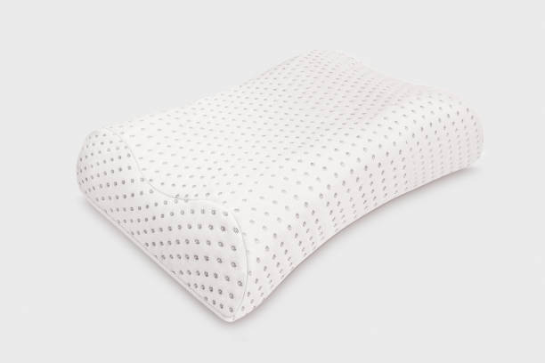 istock Orthopedic Pillow with a Memory Effect. Medical treatment pillow for sleep. Comfort Memory Pillow under the head with a recess under the shoulder isolated on white background. Sleeping Support Pillow 1219370640