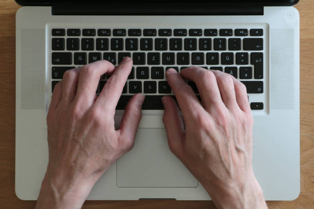 istock home office at a laptop 1219371028