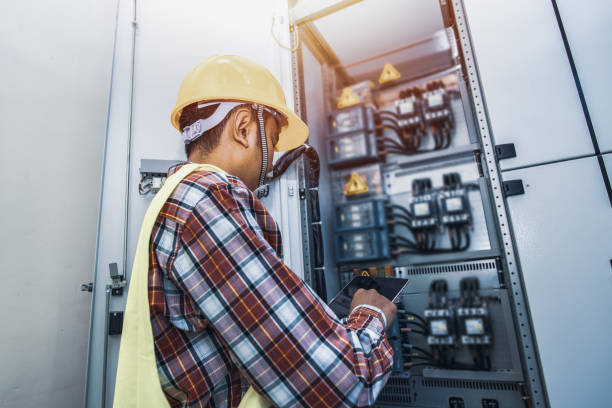 istock Engineer standing in front of the control panel in the control room. 1219372535
