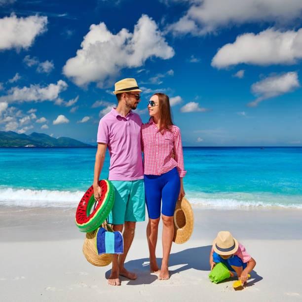istock Family with three year old boy on beach. Seychelles, Mahe. 1219372593