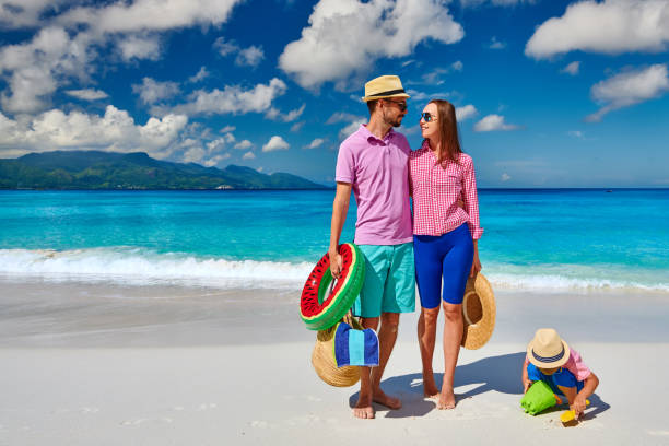 istock Family with three year old boy on beach. Seychelles, Mahe. 1219372597