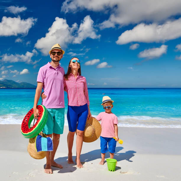 istock Family with three year old boy on beach. Seychelles, Mahe. 1219372598