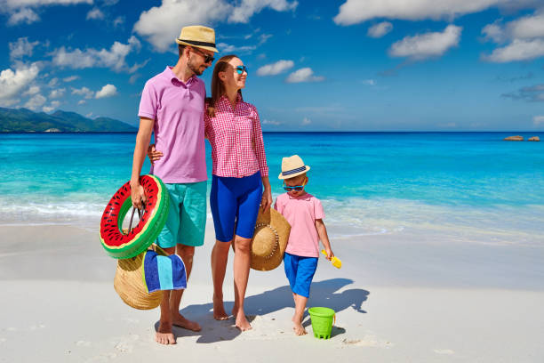 istock Family with three year old boy on beach. Seychelles, Mahe. 1219372600