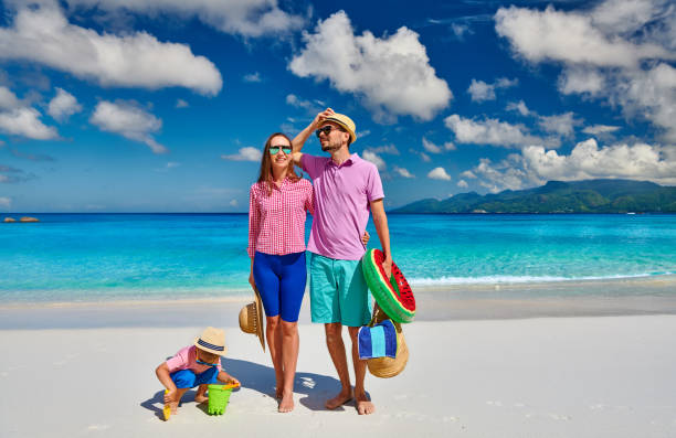 istock Family with three year old boy on beach. Seychelles, Mahe. 1219372619