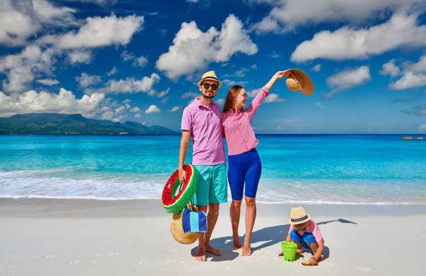 istock Family with three year old boy on beach. Seychelles, Mahe. 1219372621
