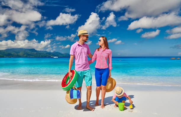 istock Family with three year old boy on beach. Seychelles, Mahe. 1219372622