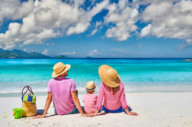 istock Family with three year old boy on beach. Seychelles, Mahe. 1219372643