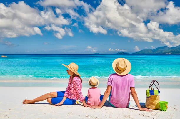 istock Family with three year old boy on beach. Seychelles, Mahe. 1219372646