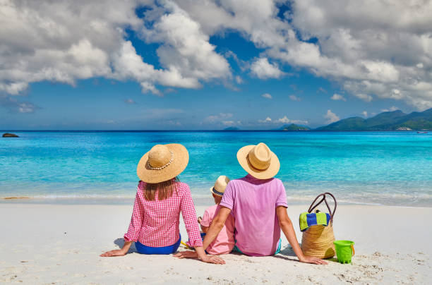 istock Family with three year old boy on beach. Seychelles, Mahe. 1219372667