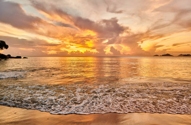 istock Beautiful sunset at Seychelles beach 1219372701