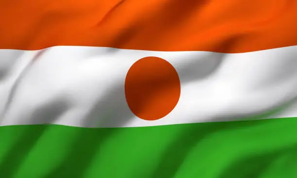 Flag of Niger blowing in the wind. Full page Nigerien flying flag. 3D illustration.