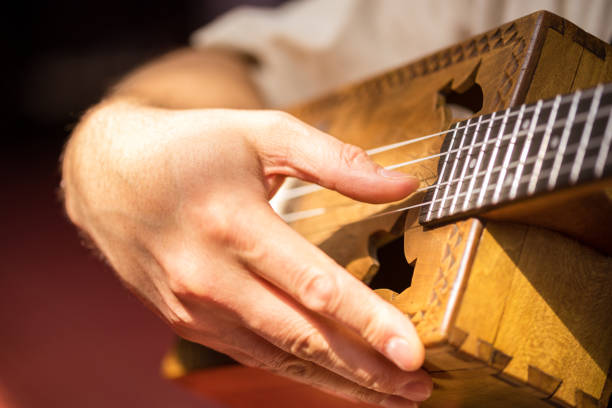 istock Hand of man in classical guitar. 1219375751