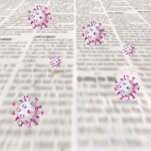 istock Coronavirus Covid-19 news. Newspaper surface with flying virus. Old newspapers background. 1219375791