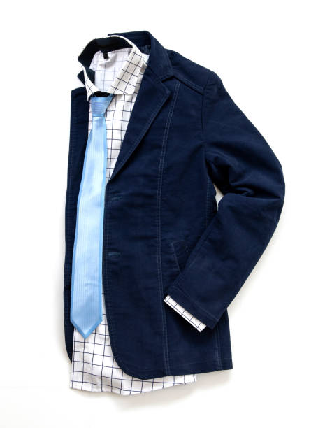 istock Blue jacket and white shirt with tie isolated on a white background. Top view 1219377492