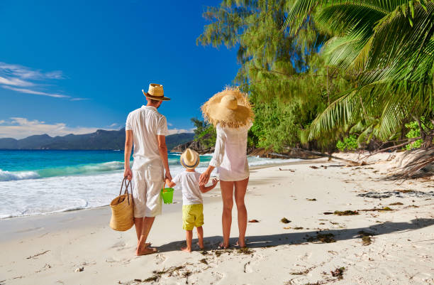 istock Family with three year old boy on beach. Seychelles, Mahe. 1219378428