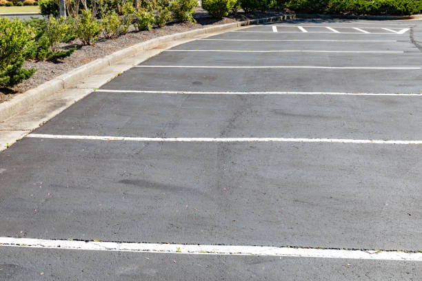 istock Paved and lined parking lot, asphalt with formed concrete curb 1219378723