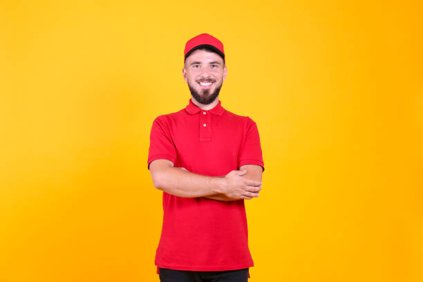 istock Young man with perfectly groomed beard delivering a package. 1219380769