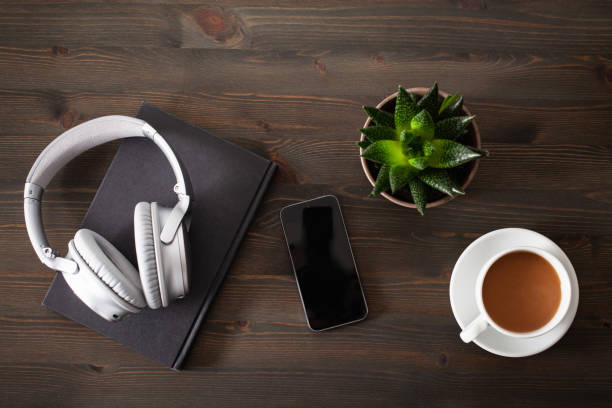 istock audiobook concept modern wireless headphones smartphone book 1219381234
