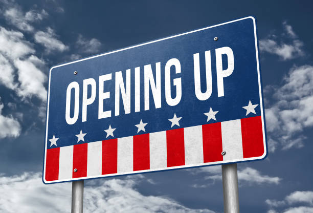 istock Opening Up - roadsign message as 3D illustration 1219384086