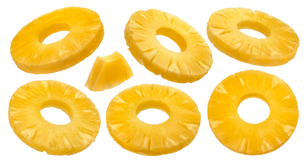 istock Canned pineapple rings isolated on white background 1219384901