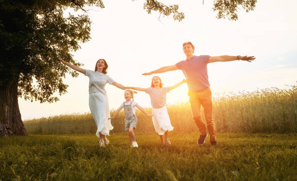 istock Happy family on summer walk 1219385755