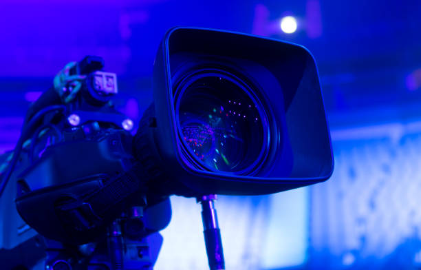 istock tv camera in a concert hall. Digital TV camera. 1219386436