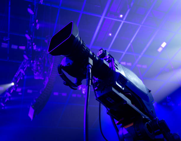 istock tv camera in a concert hall. Digital TV camera. 1219386455