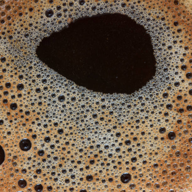 istock Thick coffee foam closeup top view 1219387285