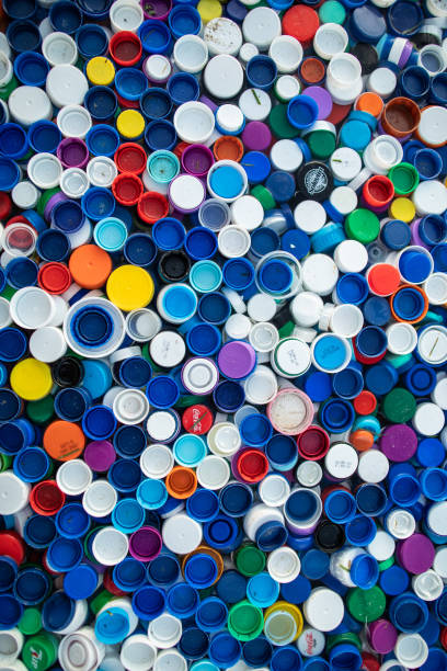 istock Pile of plastic closures 1219387329