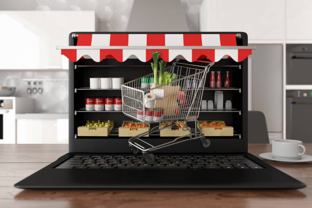 istock E-Commerce Online Shopping Concept with Laptop in Kitchen 1219390749