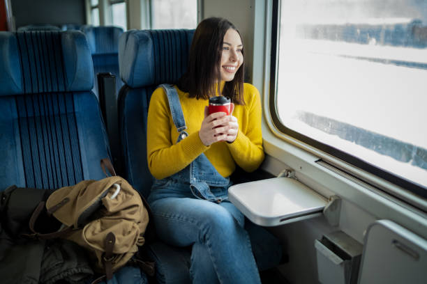 istock Young woman traveling by train 1219391029