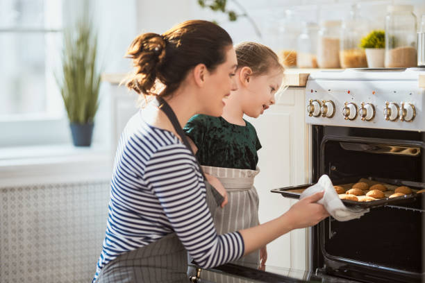 istock Happy family in the kitchen. 1219391407