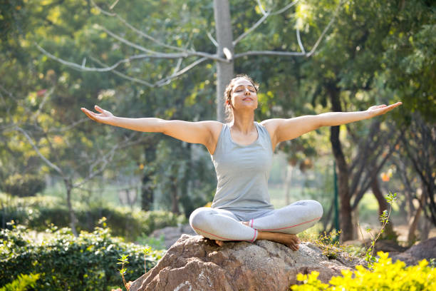 istock Beautiful woman exercising at park 1219392594