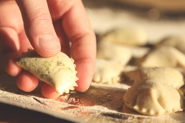 istock Traditional ravioli preparation - Italian handmade pasta 1219397204