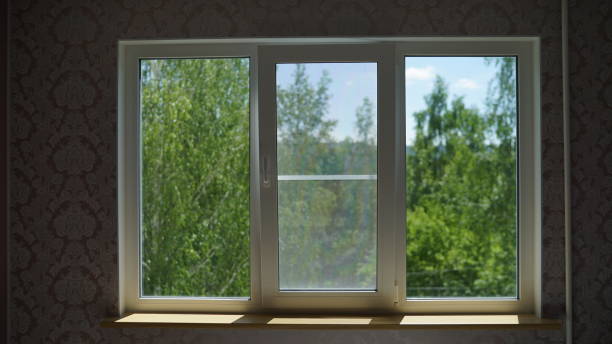 istock Plastic window overlooking the green trees. window overlooking mountains. 1219401594