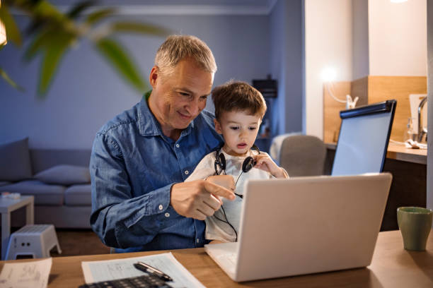 istock Discovering the digital world with dad 1219402891