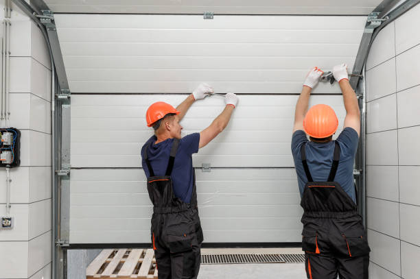 Lifting gates of the garage. Workers are installing lifting gates of the garage. garage stock pictures, royalty-free photos & images