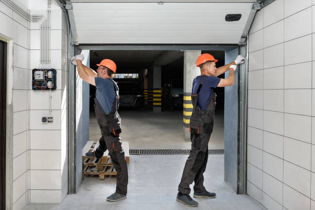 Lifting gates of the garage. Workers are installing lifting gates of the garage. vehicle door stock pictures, royalty-free photos & images