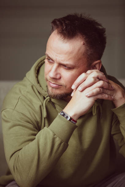 istock Thoughtful Man In Casual Sweatshirt 1219407067