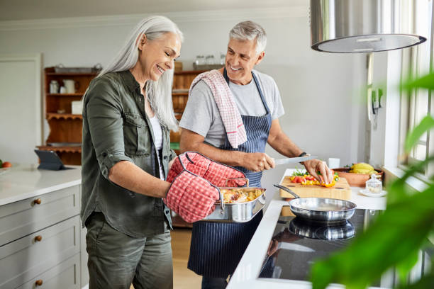Couple preparing food together at home