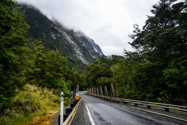 Photo of Road Over a Bridge in the Mountains